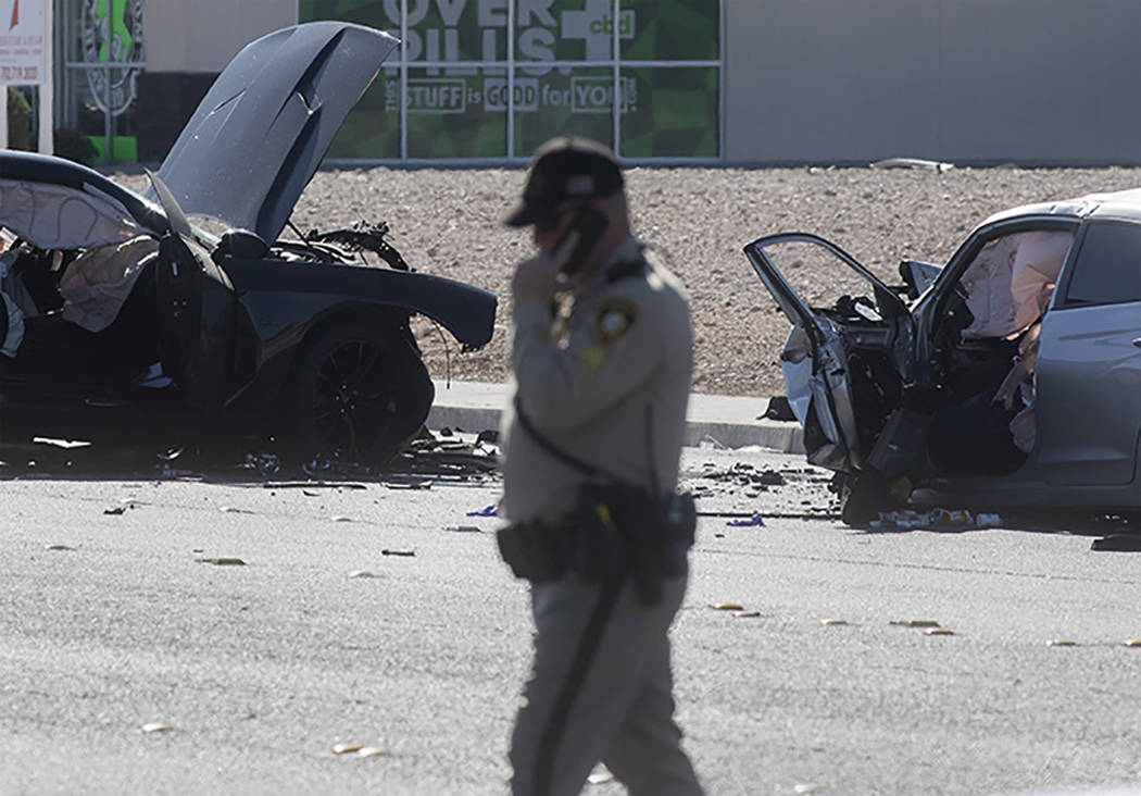 Las Vegas police investigate a fatal collision at the intersection of South Fort Apache Road an ...