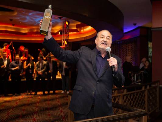 Hard Rock Hotel CEO Richard “Boz” Bosworth toasts the crowd during an event to sa ...