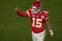 Kansas City Chiefs quarterback Patrick Mahomes (15) gestures after Damien Williams scores his s ...