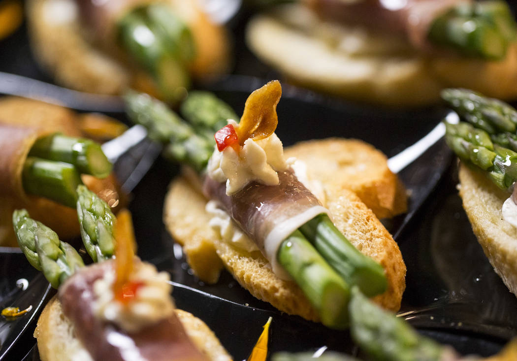Asparagus wrapped in prosciutto appetizers during the 44th Annual UNLVino fundraiser at the Kee ...