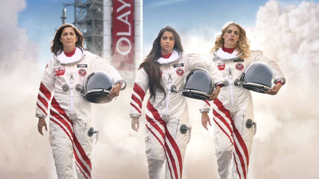 This undated image provided by Olay shows from left, retired astronaut Nicole Stott, Lilly Sing ...