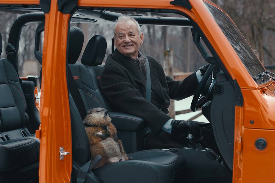 This undated image provided by Jeep shows Bill Murray reprises his role as Phil Connors from th ...
