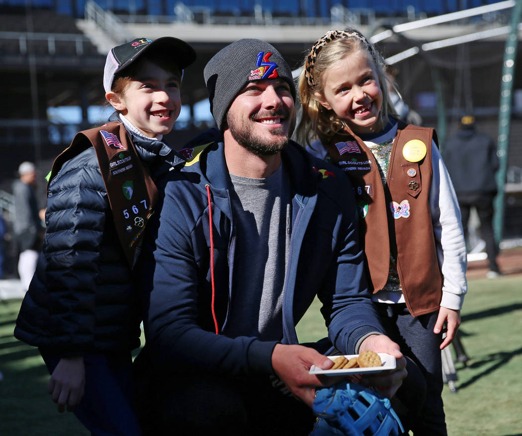Chicago Cubs player Kris Bryant meets 7-year-olds Audrey Neal, left, and Audrey Shaw, of the Gi ...