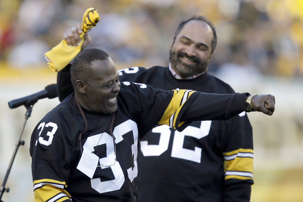 Pittsburgh Steelers Hall of Fame running back Franco Harris, right, and former running back Joh ...