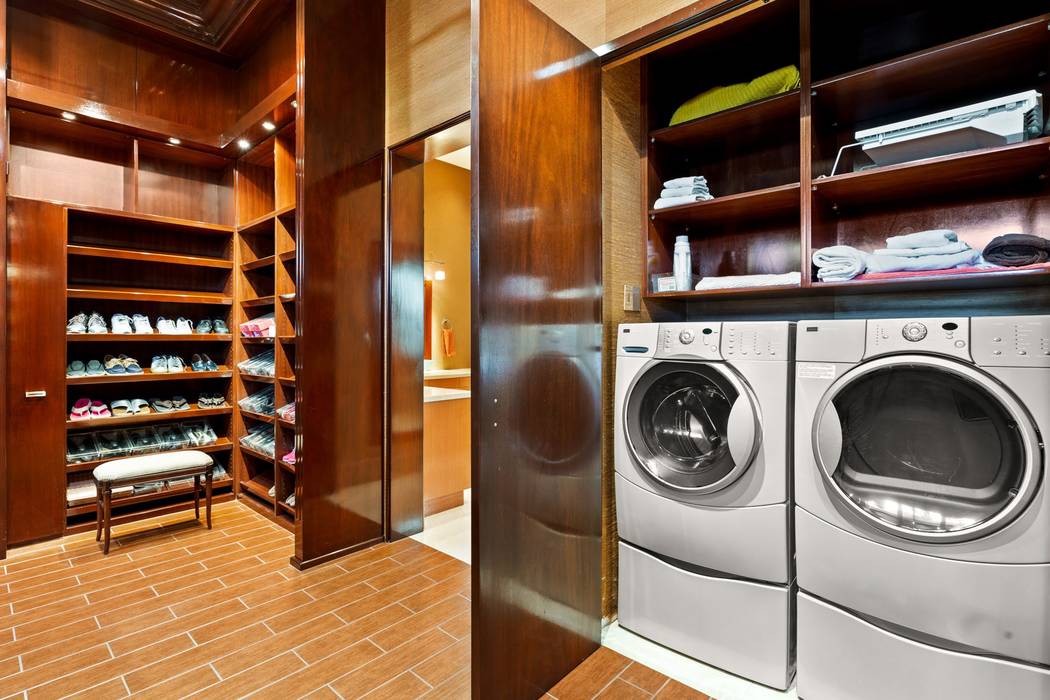 The closet has a laundry area. (Ivan Sher Group)