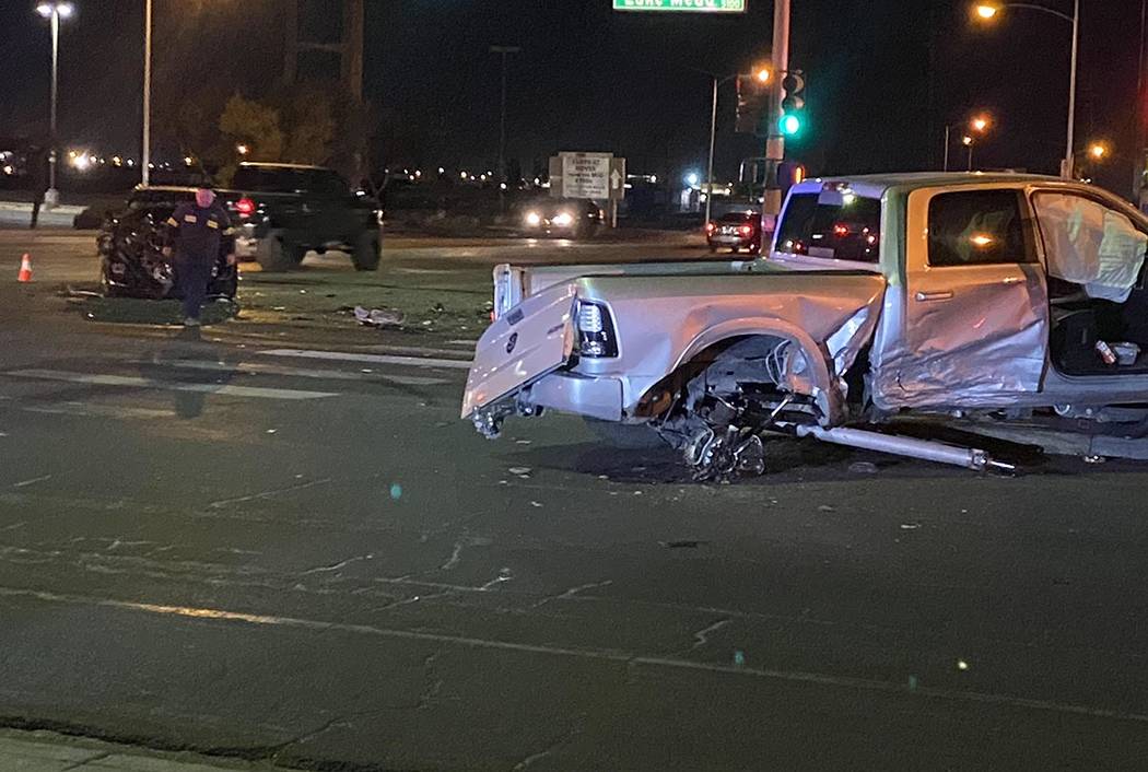 The rear axle of a pickup truck is gone after a collision at Nellis and Lake Mead boulevards on ...