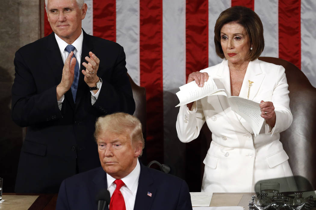 House Speaker Nancy Pelosi of Calif., tears her copy of President Donald Trump's s State of the ...