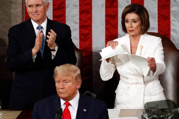 House Speaker Nancy Pelosi of Calif., tears her copy of President Donald Trump's s State of the ...