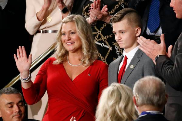 Kelli and Gage Hake of Stillwater, Okla., are recognized by President Donald Trump during his S ...