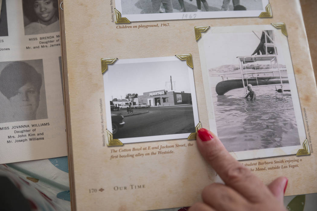 Jackie Brantley, who grew up blocks away from Jackson Street in West Las Vegas, shows a photogr ...