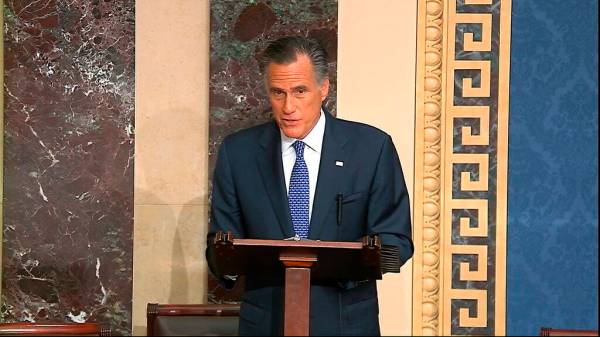 Sen. Mitt Romney, R-Utah, speaks on the Senate floor about the impeachment trial against Presid ...