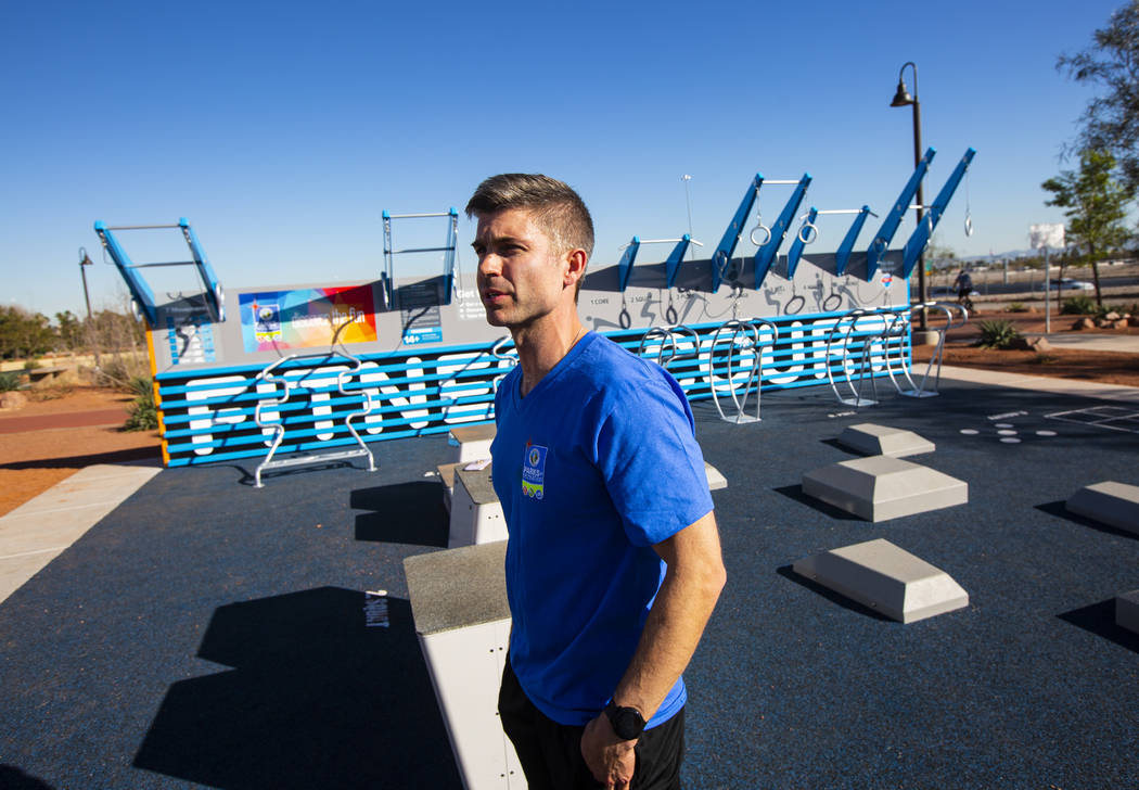 Seth Floyd talks about the new Fitness Court at Bill Briare Family Park in Las Vegas on Friday, ...