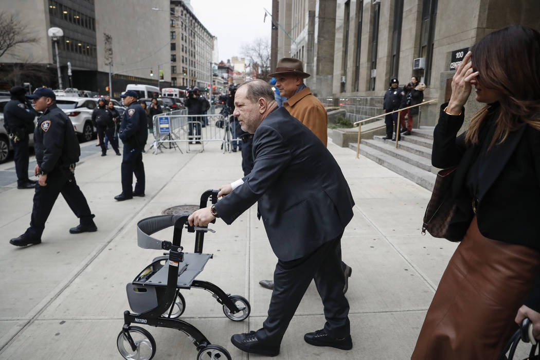 Harvey Weinstein departs a Manhattan courthouse for his rape trial, Wednesday, Feb. 5, 2020, in ...