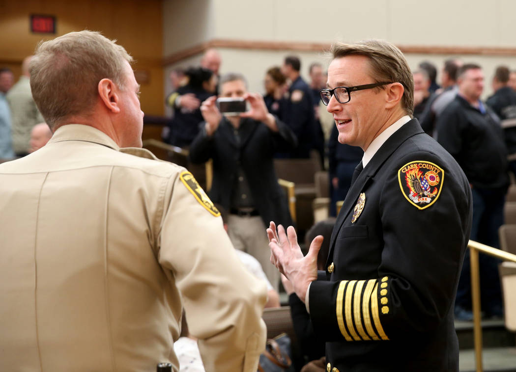 Incoming Clark County Fire Department Chief John Steinbeck visits with Clark County Undersherif ...
