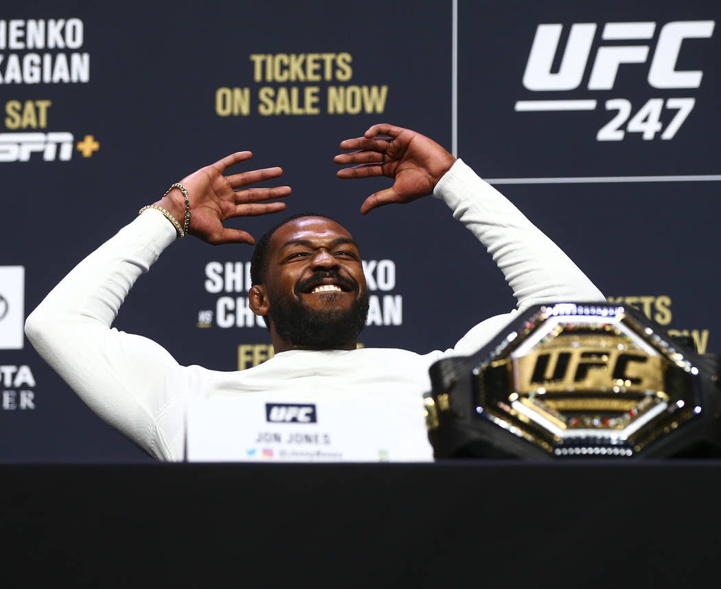 Jon Jones reacts during a press conference ahead of UFC 247, where he is slated to take on Domi ...