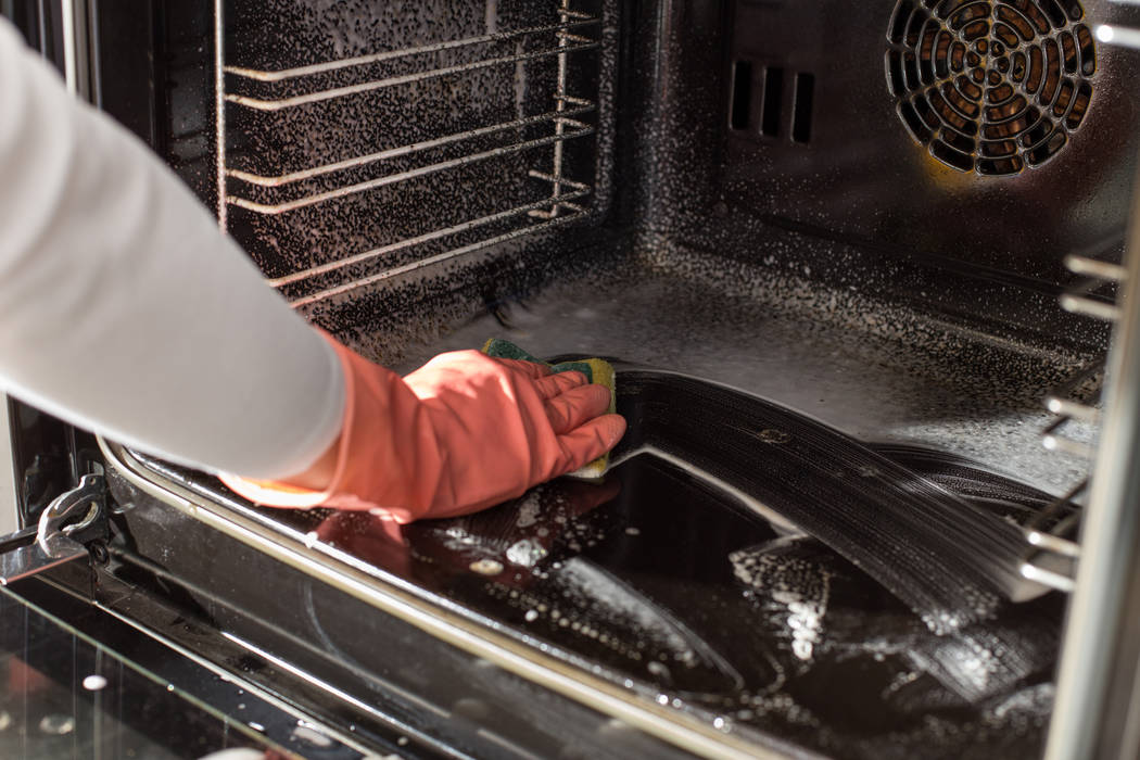 Getty Images Spring is a good time to clean the oven and microwave, especially if you cooked an ...