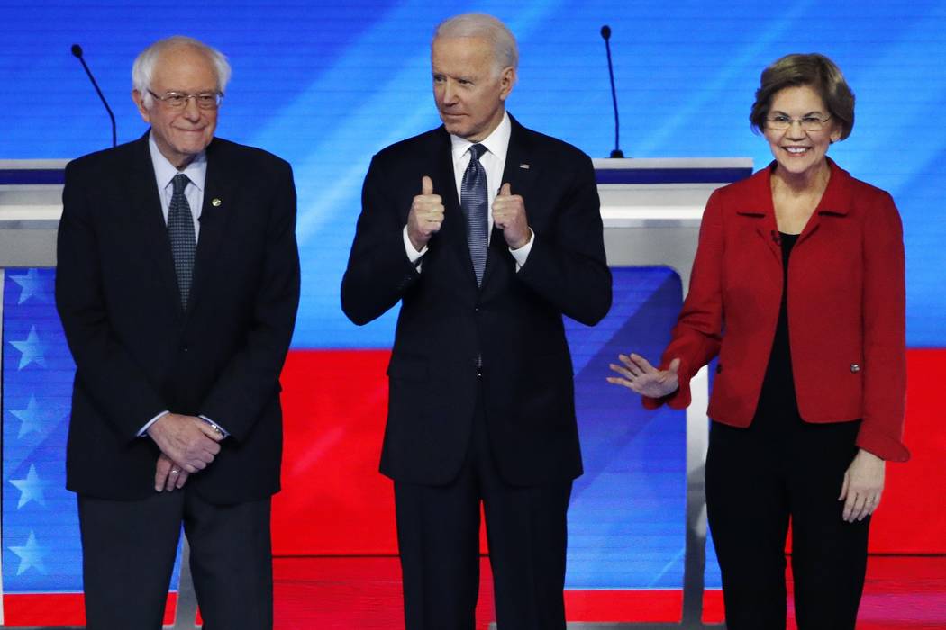 Democratic presidential candidates from left, Sen. Bernie Sanders, I-Vt., former Vice President ...