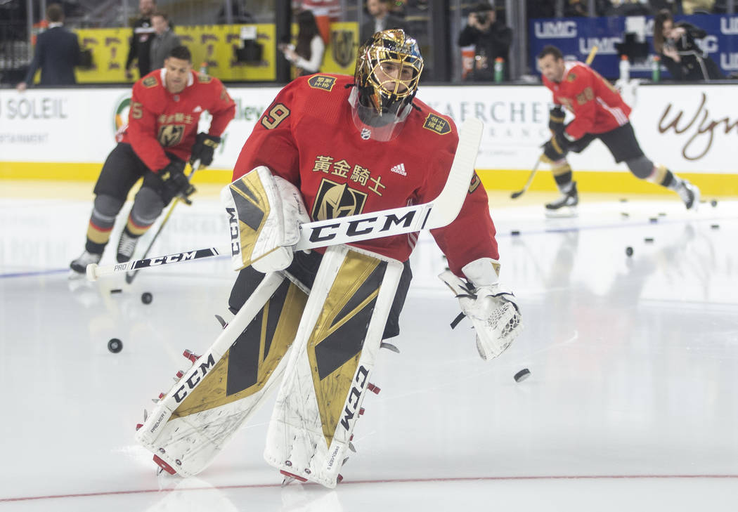 Vegas Golden Knights goaltender Marc-Andre Fleury (29) wears a jersey commemorating Chinese New ...
