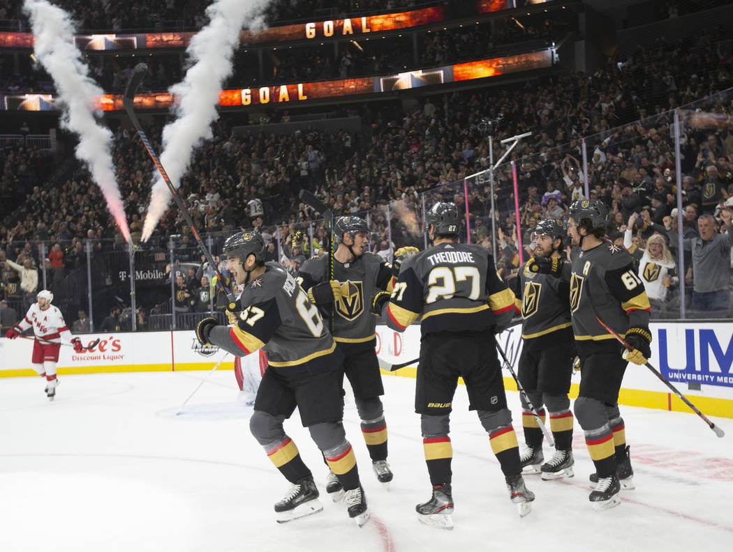 Vegas Golden Knights left wing Max Pacioretty (67) celebrates with teammates after scoring a fi ...