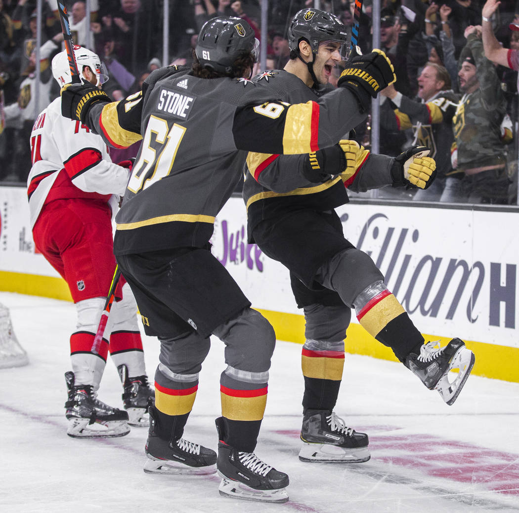Vegas Golden Knights left wing Max Pacioretty (67) celebrates with Vegas Golden Knights right w ...