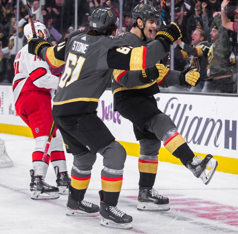 Vegas Golden Knights left wing Max Pacioretty (67) celebrates with Vegas Golden Knights right w ...