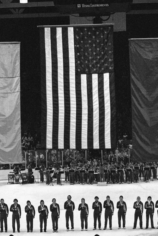 In this Feb. 24, 1980 file photo, members of the 1980 USA Olympic ice hockey team stand on the ...