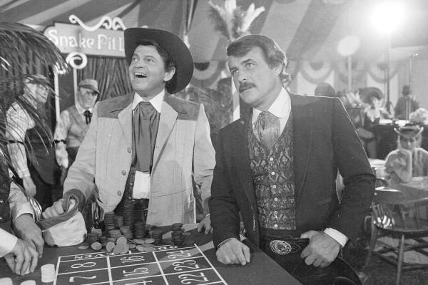 Actors Ross Martin, left, and Robert Conrad, right, are shown while filming a scene of the moti ...