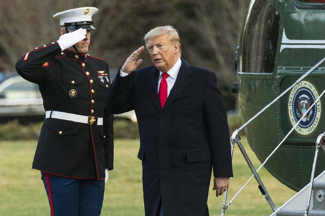 President Donald Trump arrives at the White House, Friday, Feb. 7, 2020, in Washington, from a ...