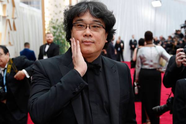 Bong Joon-ho arrives at the Oscars on Sunday, Feb. 9, 2020, at the Dolby Theatre in Los Angeles ...