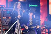 Steven Tyler, left, and Joe Perry, of Aerosmith, perform at the 62nd annual Grammy Awards on Su ...