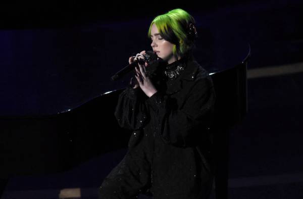 Billie Eilish performs during the in memoriam tribute at the Oscars on Sunday, Feb. 9, 2020, at ...