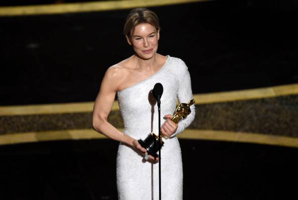 Renee Zellweger accepts the award for best performance by an actress in a leading role for &quo ...