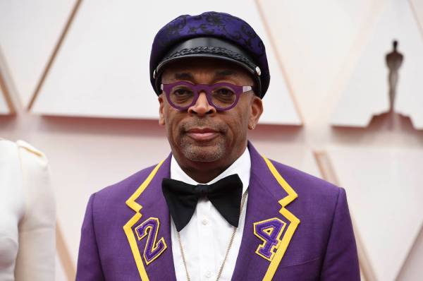 Spike Lee arrives at the Oscars on Sunday, Feb. 9, 2020, at the Dolby Theatre in Los Angeles. ( ...