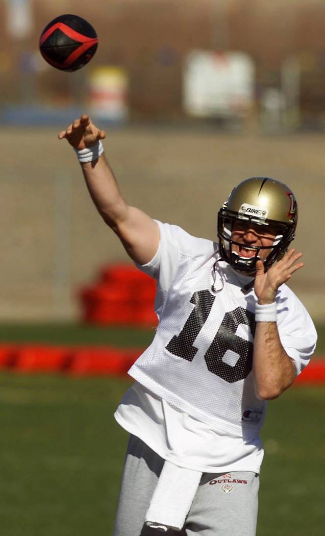 Sports; 01-31-01, Las Vegas Outlaws QB #16 Ryan Clement throws the football during the team's ...