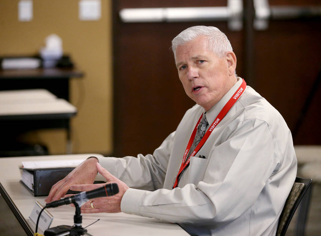 Ronald Averett, a former lieutenant at the Henderson Police Department, testifies during a comm ...