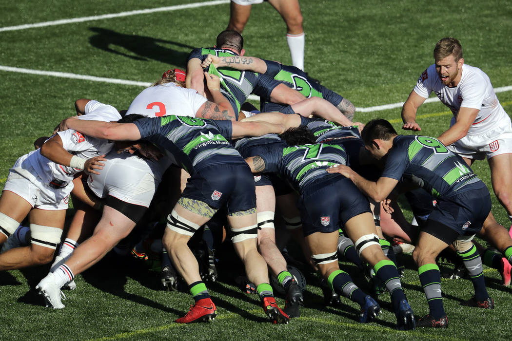 Seattle Seawolves, right, and San Diego Legion players square off in a scrum Sunday, April 22, ...