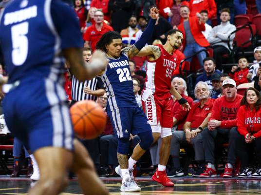 UNLV's Elijah Mitrou-Long (55) reacts after his shot comes short at the end of overtime as UNR' ...