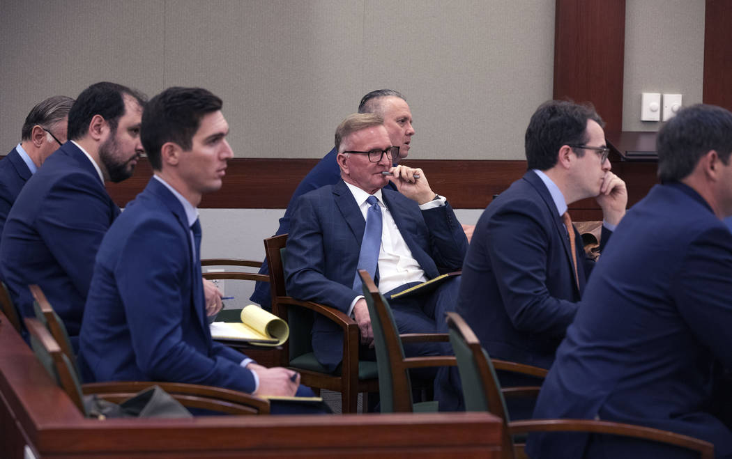 Attorneys representing former residents of the Alpine Motel Apartments listen to the judge at t ...