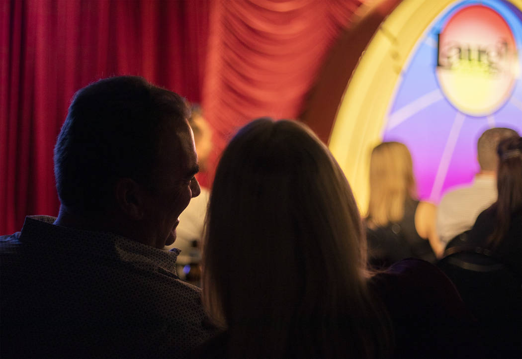 Audience members at The Laugh Factory Comedy Club enjoys Shayma Tash's set in February 2020 in ...