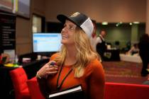 Ashley Taylor watches a race during the National Horseplayers Championship at Bally's Las Vegas ...