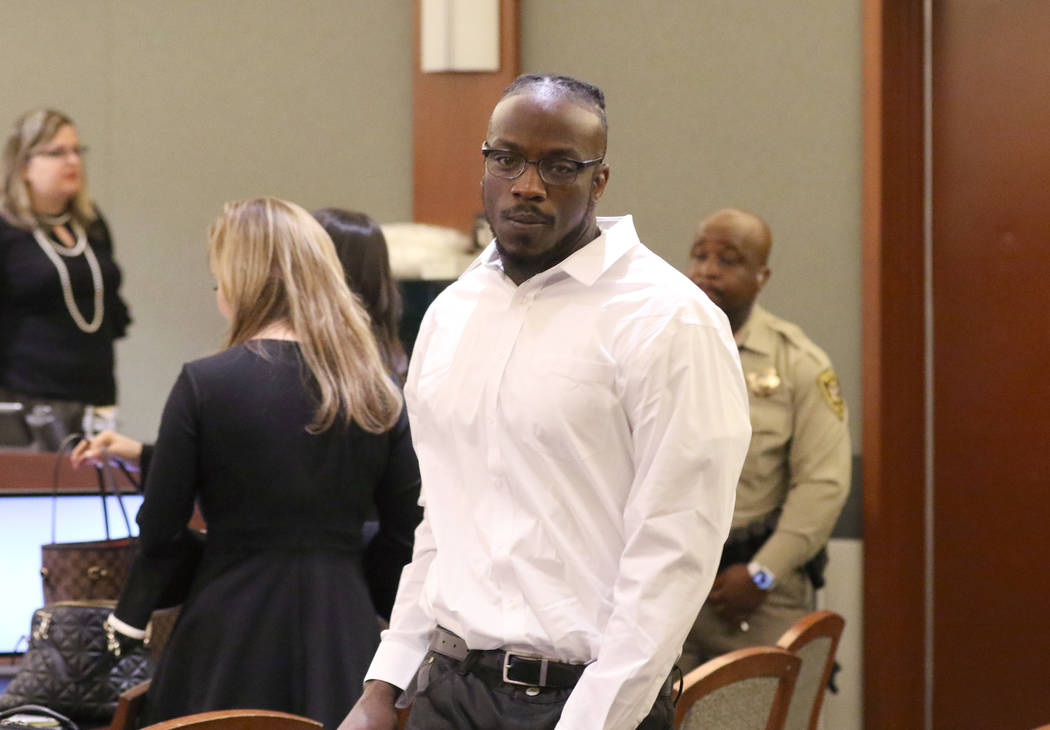 Durwin Allen, charged in the killings of Myron Manghum, 33, and Alyssa Velasco, 27, leaves the ...
