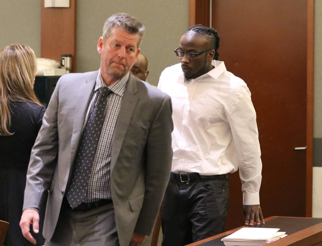Durwin Allen, right, charged in the killings of Myron Manghum, 33, and Alyssa Velasco, 27, leav ...