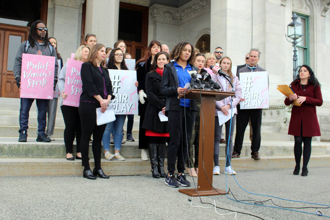 Danbury High School sophomore Alanna Smith speaks during a news conference at the Connecticut S ...