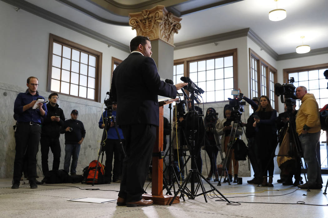 Iowa Democratic Party chairman Troy Price speaks to members of the media during a news conferen ...
