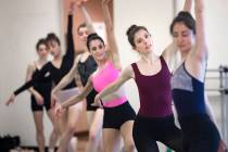 Katie Zimmerman dances in a line with others during rehearsal for "The Current," an original wo ...
