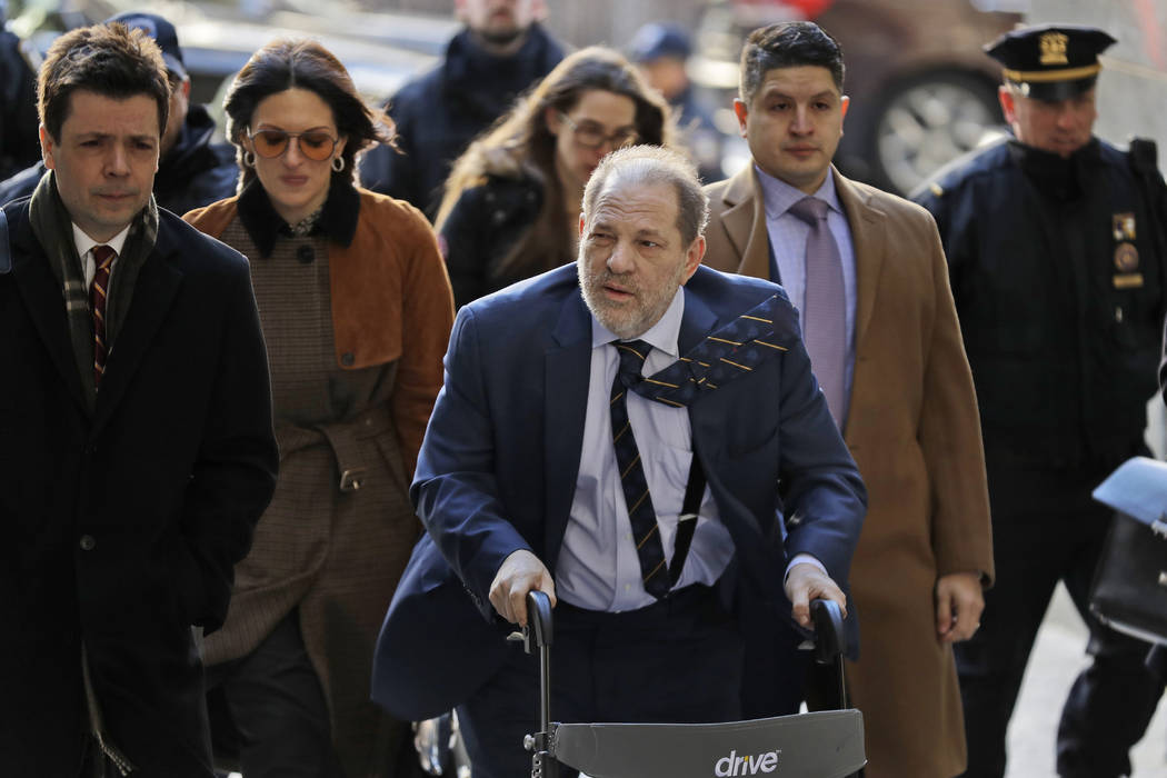 Harvey Weinstein arrives at a Manhattan courthouse for his rape trial in New York, Friday, Feb. ...