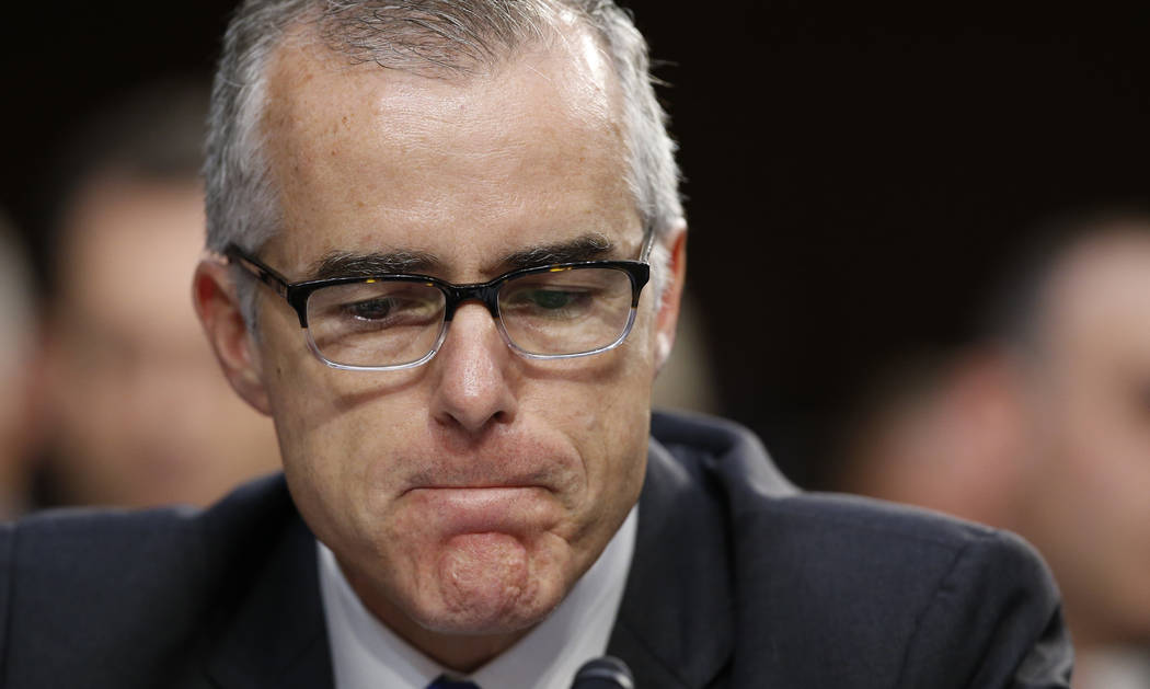FILE - In this June 7, 2017 file photo, then Acting FBI Director Andrew McCabe pauses during a ...
