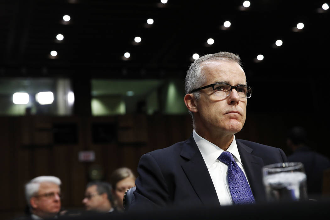 FILE - In this May 11, 2017 file photo, then Acting FBI Director Andrew McCabe listens during a ...