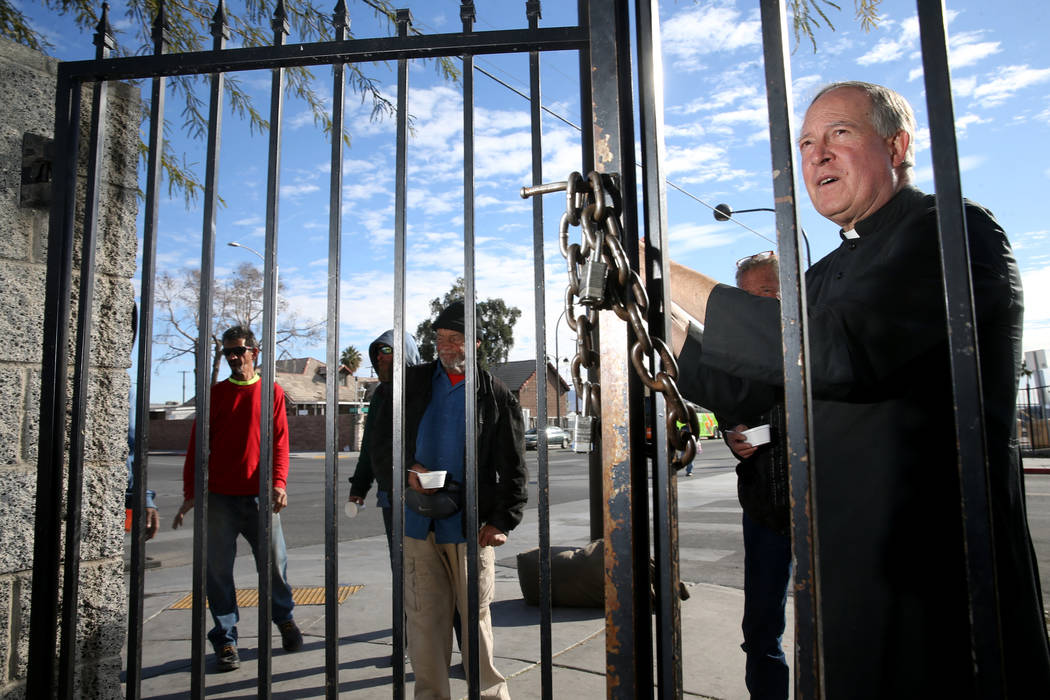 The Rev. Courtney Krier prepares for free breakfast service at St. Joseph's Catholic Church on ...