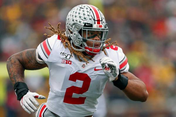 FILE - In this Nov. 30, 2019, file photo, Ohio State defensive end Chase Young plays against Mi ...
